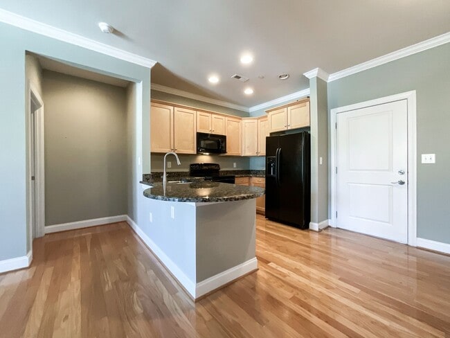 Building Photo - COMING SOON! Charlotte Living at Its Best!...