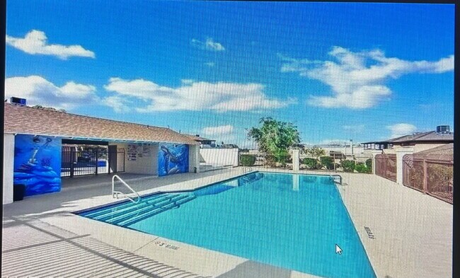 Building Photo - 2 bedroom 2 bathroom second level unit centrally located in the El Sol del Pueblo community.