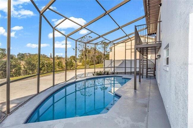 Building Photo - 8315 Village Green Rd