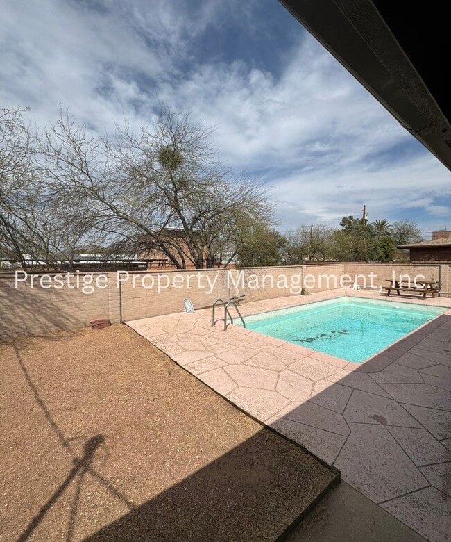 Building Photo - Stop Your Search! This 3/2+ Bonus Room is Centrally Located with a Pool and More!