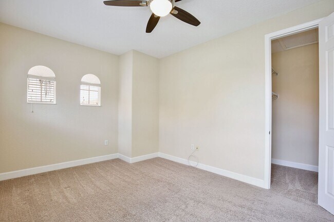 Building Photo - Stylish and Spacious 3/2.5 Townhome with Premium Features and Community Pools