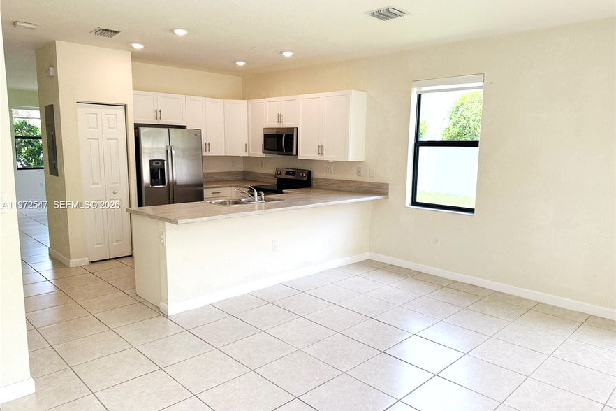 Building Photo - 10623 W 33rd Ct