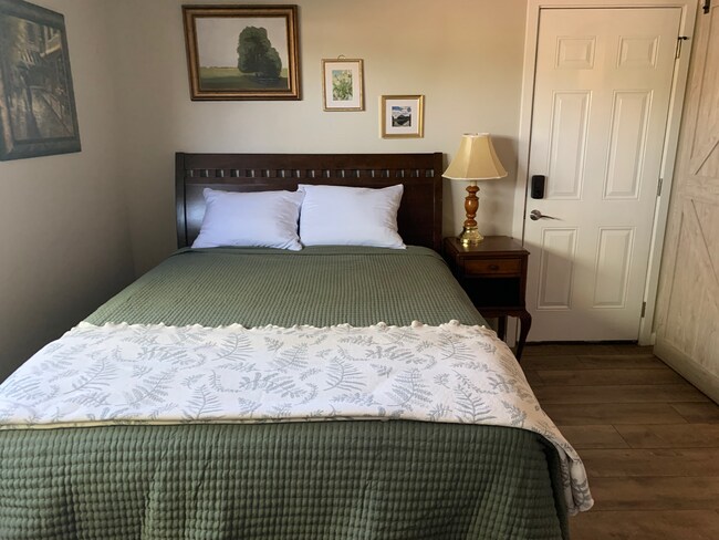 Queen Bed. Exterior Door - 5524 Chauncey Way