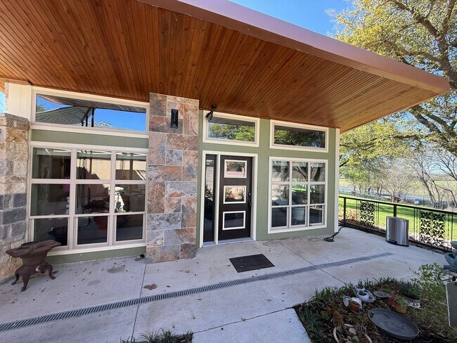 Building Photo - Custom built condo! Country Living! Offered unfurnished OR furnished!