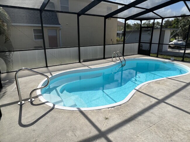 Building Photo - Charming 1-Bed Retreat Waterfront W/Pool W...