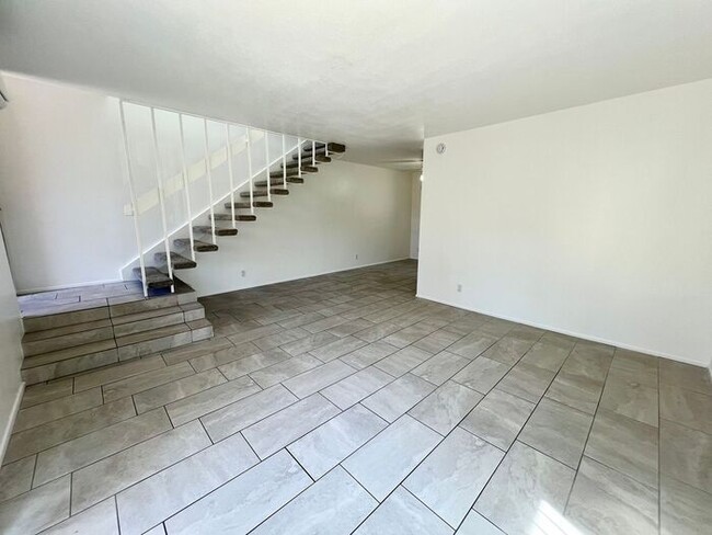 Building Photo - Spacious 2BR/1.5BA Townhome with A/C, Parking & Luxury Community Amenities