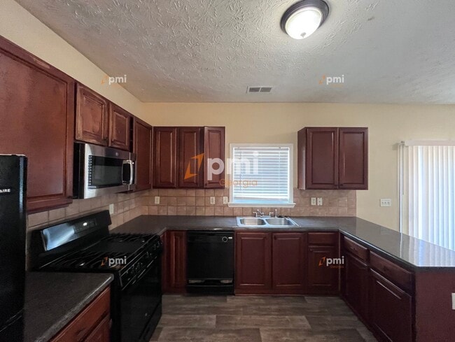 Building Photo - 7151 Flagstone Pl