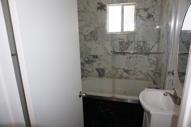 Building Photo - 7633 Enfield Ave