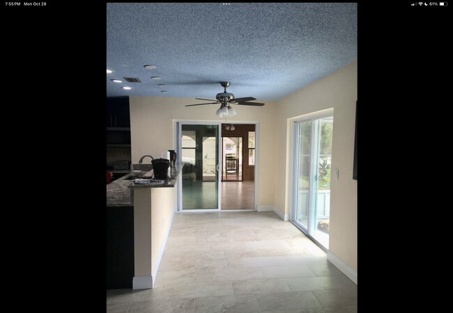 Kitchen looking at game room - 312 14th St SW