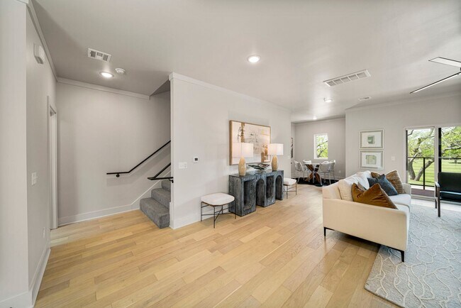 Building Photo - Discover modern elegance in the newly constructed Edgewater Condominiums, a boutique community fe...