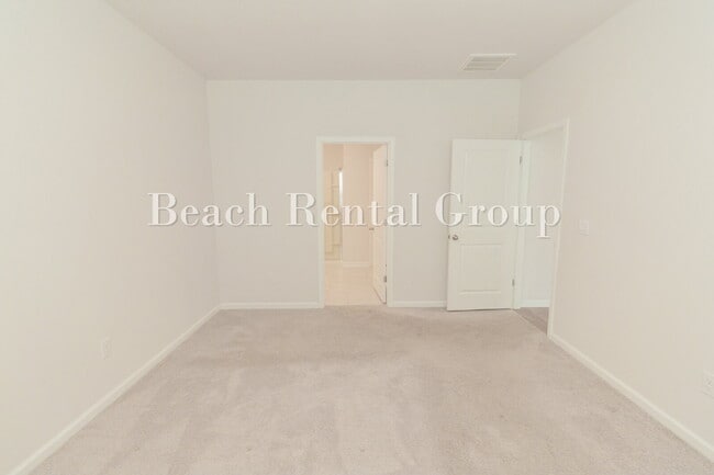 Building Photo - Spacious 4 Bedroom with Pond View