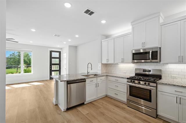 Building Photo - 7565 Reis Ln