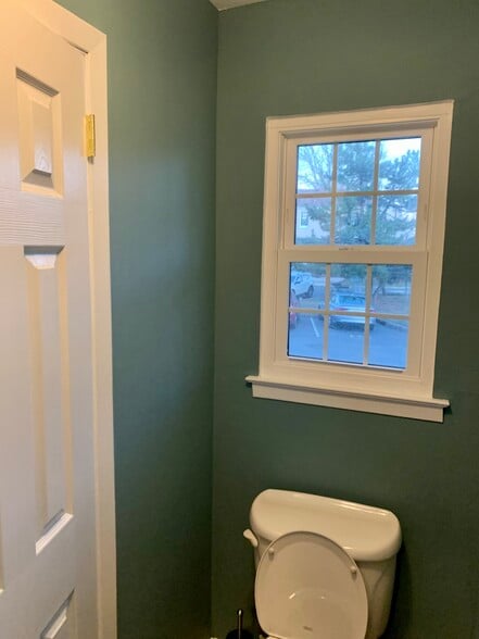 1st floor powder room ( half bath) - 1702 Regents Ct