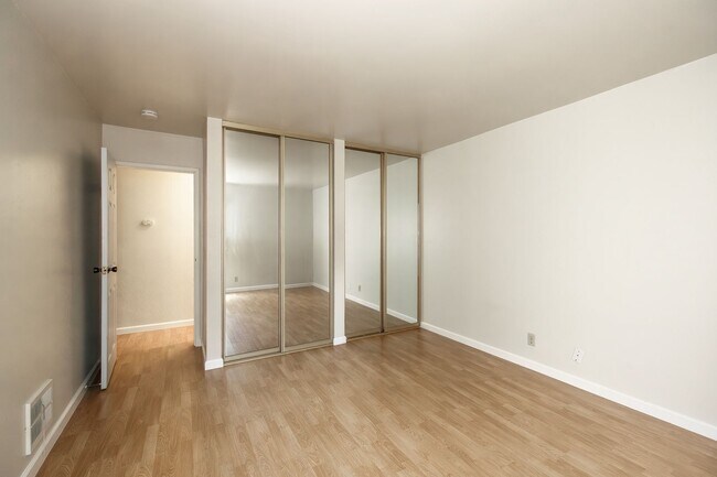 Building Photo - Peaceful Forest-View Condo with Fireplace & Private Balcony in Golden Oaks