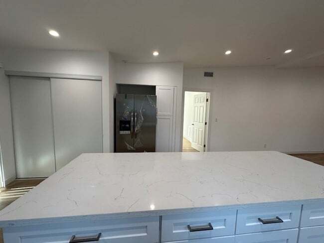 Building Photo - Completely remodeled 4+2 sprawled across a charming street in a beautiful pocket of Reseda