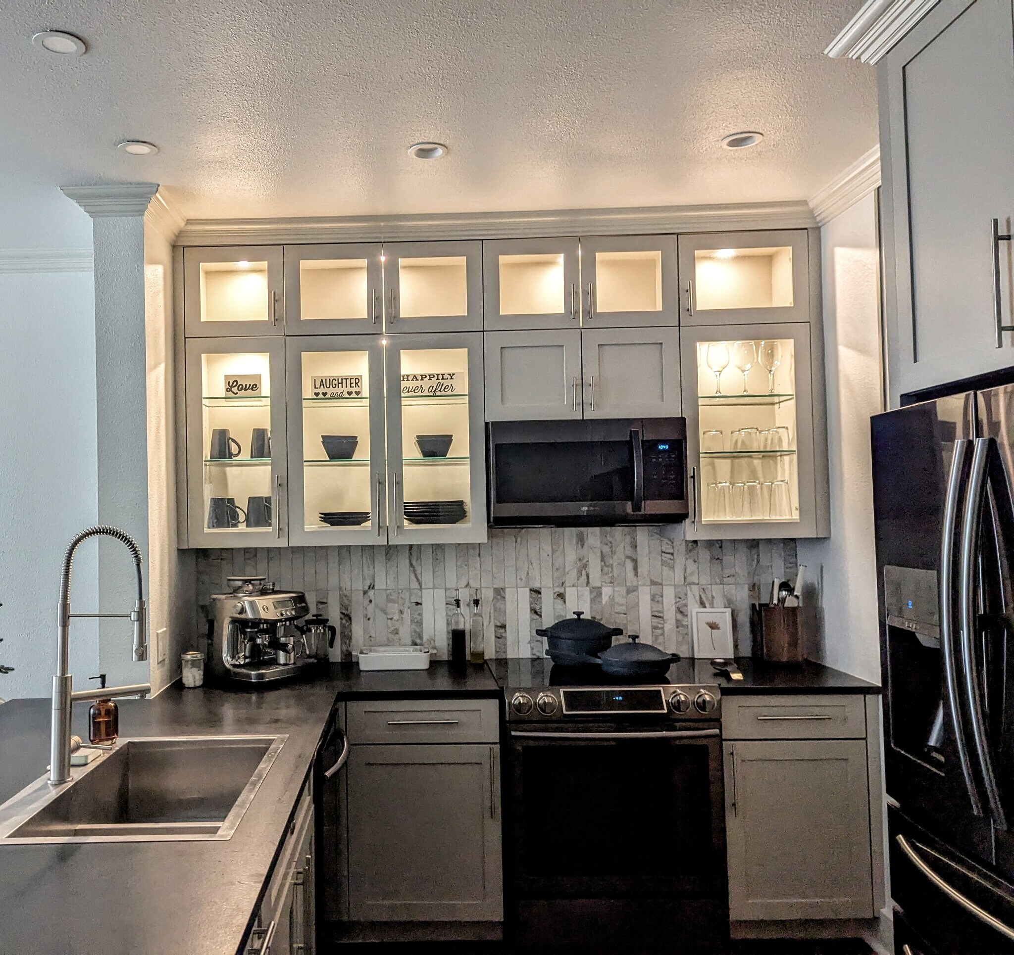 Beautiful kitchen with top of the line appliances and leathered granite countertops - 4414 Cedar Springs Rd