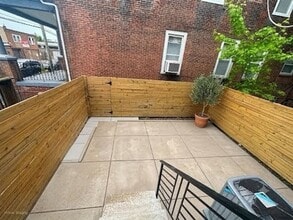 Building Photo - Renovated 2BR/2BA w/ Private Yard, Porch & In-Unit Laundry