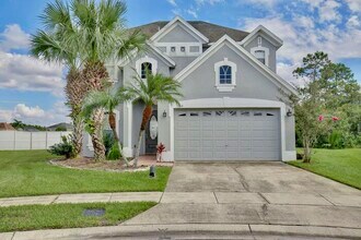 Building Photo - Gorgeous 4/2.5 Home with a 2 Car Garage Lo...