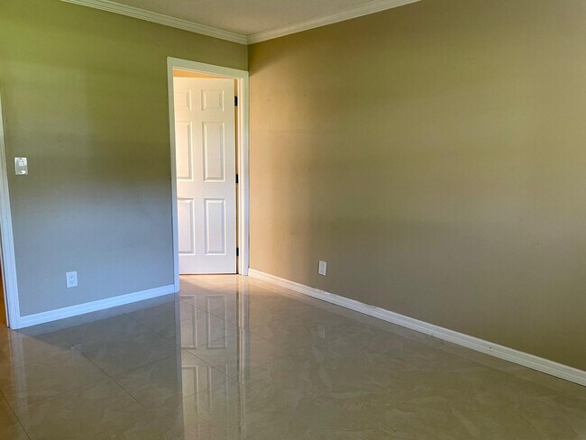 Building Photo - 608 SW Natura Blvd