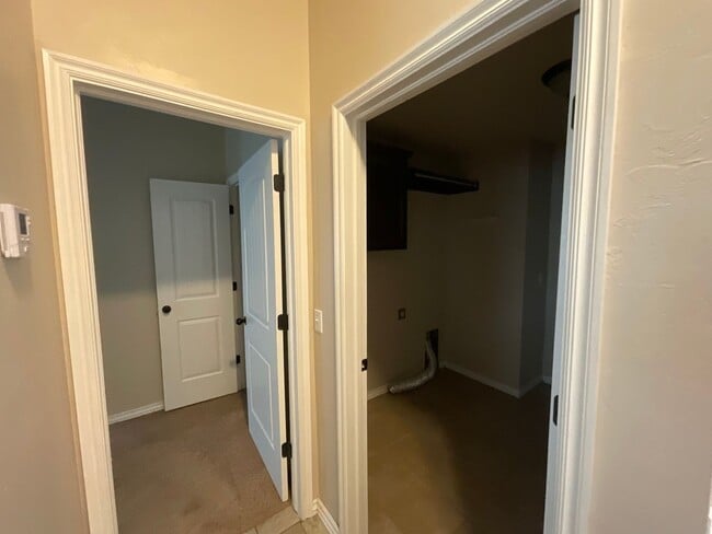 Building Photo - 4 bed, 2 bath, 2 car garage, 12-14 person Storm Shelter