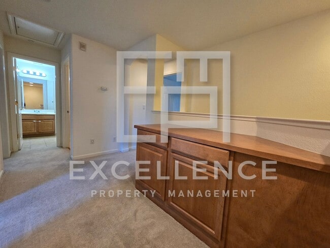 Building Photo - Spacious 3/2.5 Located In Communication Hills, With Two 1 Car Garages, W/D & Large Master Retreat