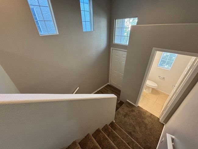 Building Photo - Spacious Tri-Level 4-Bedroom Home with Bal...