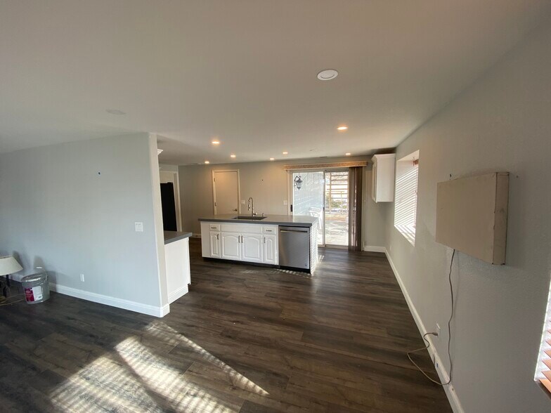 Kitchen looking towards back of garage and large patio - 17110 Waxwing Ct