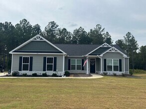Building Photo - 4 Bedroom, 2 Bath Home