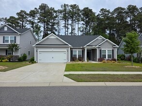 Building Photo - Coastal Comfort Awaits: Your Ideal 4-Bedro...