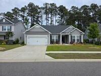 Building Photo - Coastal Comfort Awaits: Your Ideal 4-Bedro...