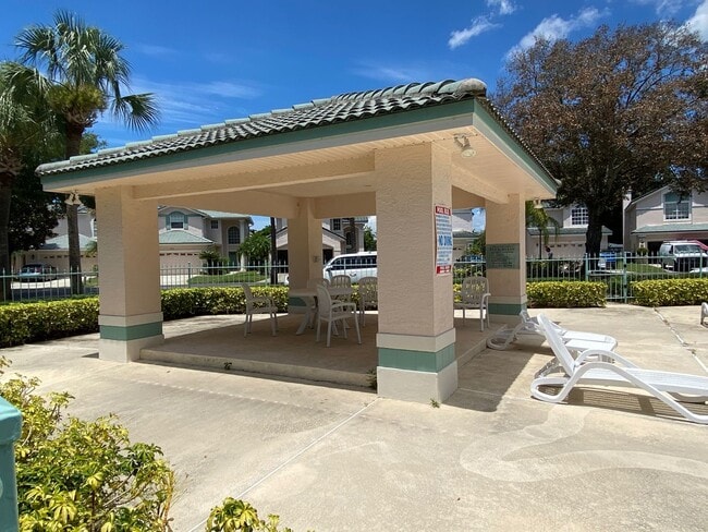 Building Photo - 3 Bedroom 2.5 Bath Cinnamon Bay Home with Stunning view, and Hardwood Flooring!