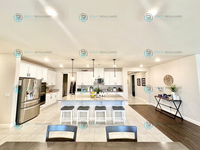 Building Photo - Welcome to your dream home, where modern elegance meets unparalleled convenience!