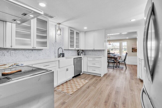 Building Photo - A spacious 3-bedroom, 2-bath layout provides plenty of room for family and guests!