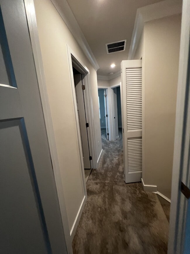 Building Photo - Exceptional 3-Level Corner Unit Townhome w...