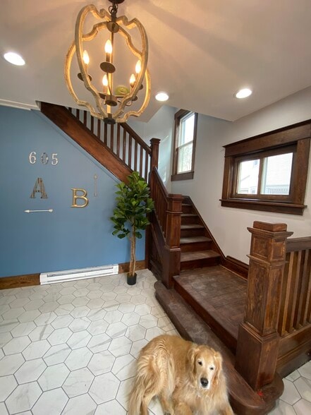 Front door common space. Stairs to apartment B. - 605 Beechwood Ave