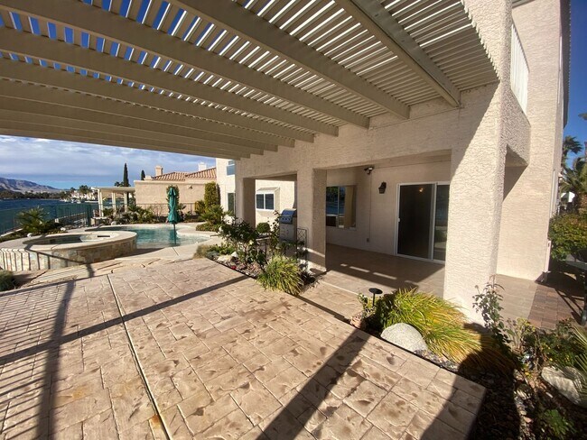 Building Photo - Vegas's Only Available Waterfront Rental ~ 4 Bedroom Desert Shores Lake Front Home