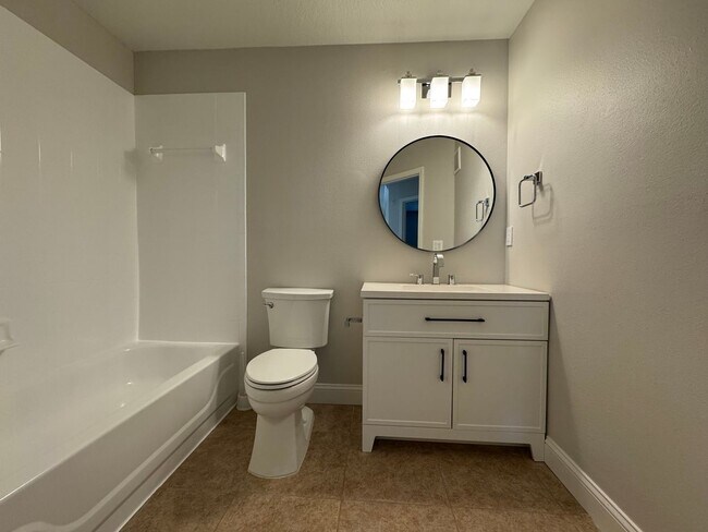 Building Photo - Oviedo 2/2 Condo with Tile & LVP Flooring, Updated Baths, New Paint & Appliances!