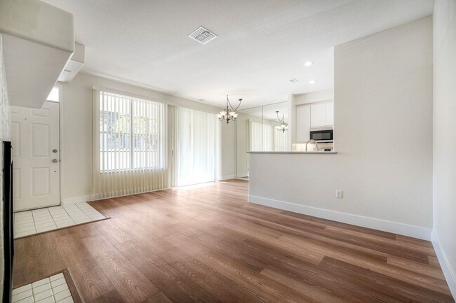 Building Photo - Coastal Living at Its Best – Upgraded 1BR Condo with Private Patio & Resort-Style Amenities