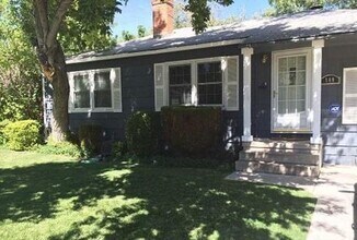Building Photo - CLOSE TO UNR - HARDWOOD FLOORS - FENCED BA...