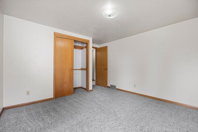 Building Photo - 4 Bedroom Remodeled with 2 Stall Detached Garage