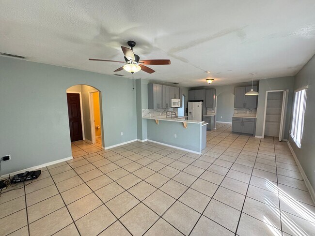 Building Photo - FULLY FENCED YARD + SOLAR PANELS + WATER F...
