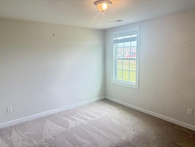 Building Photo - Beautiful Westbranch Home with 2-Car Garage, Covered Porch & Greenway Entrance Across the Street