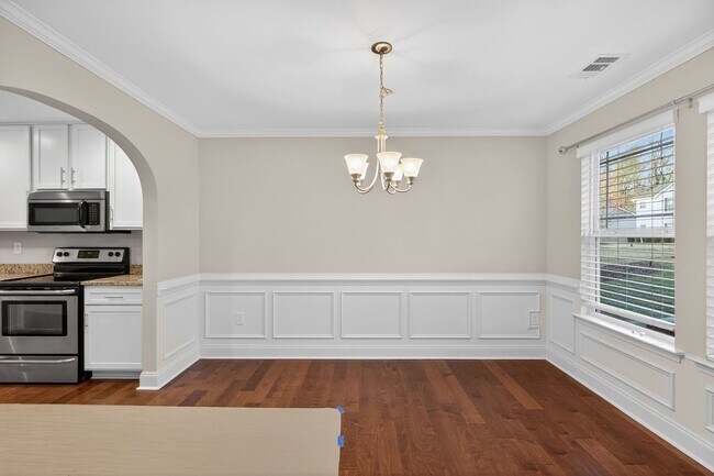 Building Photo - Move-In Ready Gem with Main-Level Owner's Suite