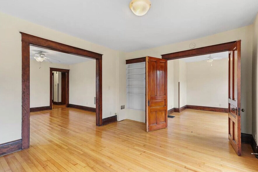Living Room looking to Dining room and Bedroom. - 707 S Dickinson St