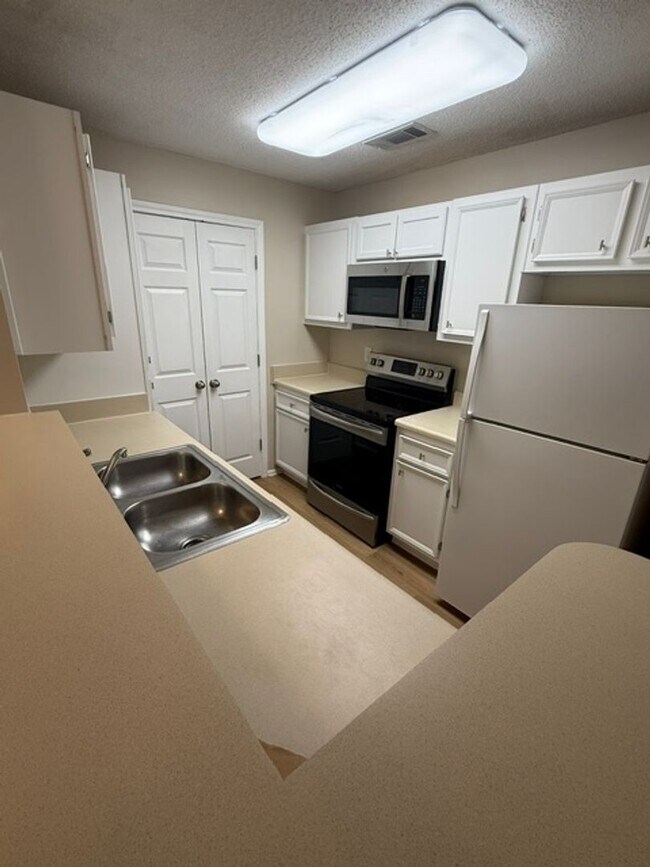 Building Photo - The Reserve at WoodBridge - Villa B216