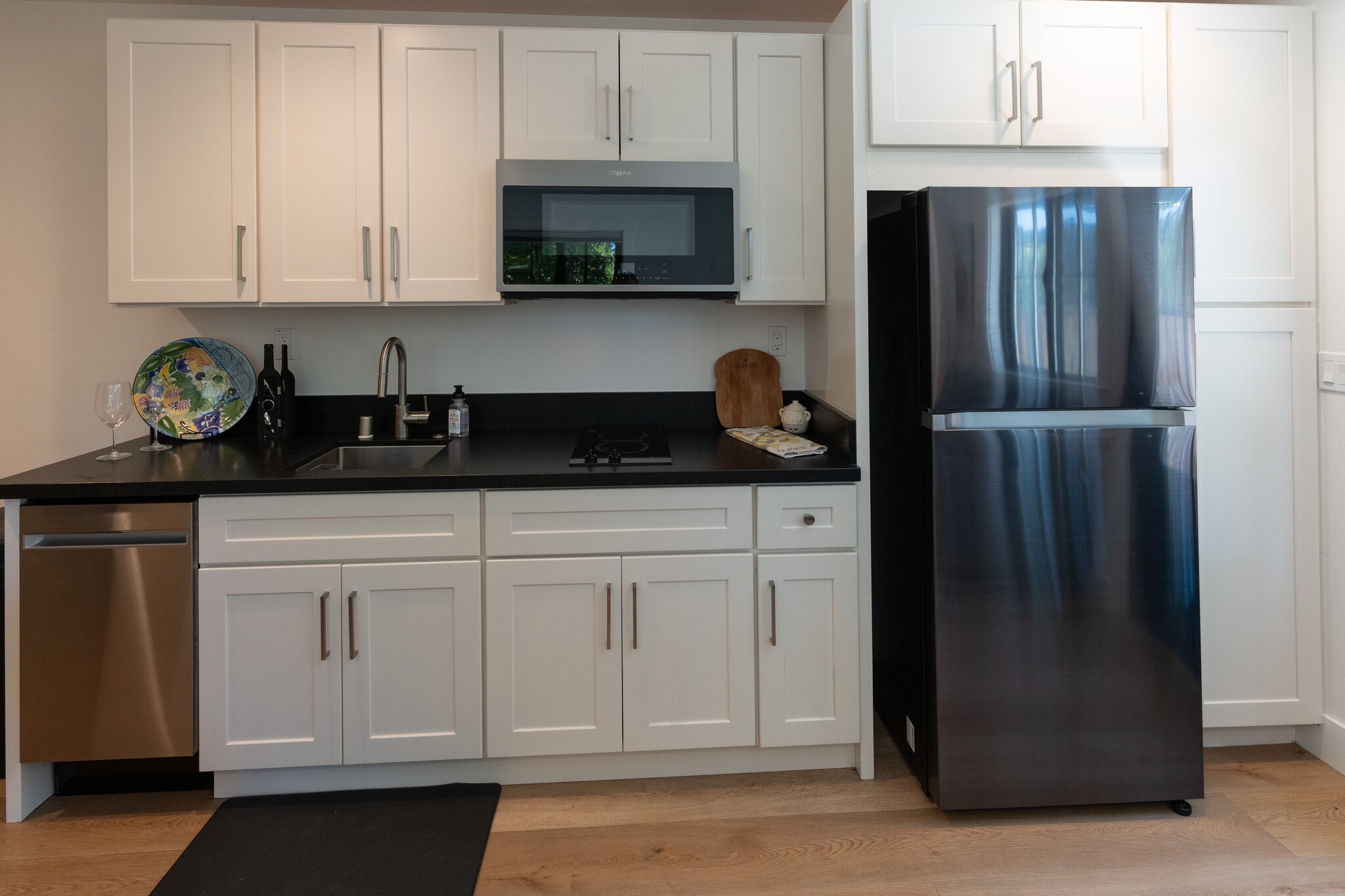 kitchen equipped with 2 burner stove, full size refrigerator, microwave with oven ca and dishwasher - 1110 Glen Rd