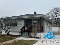 Building Photo - "Spacious 4-Bedroom Gem with Finished Base...
