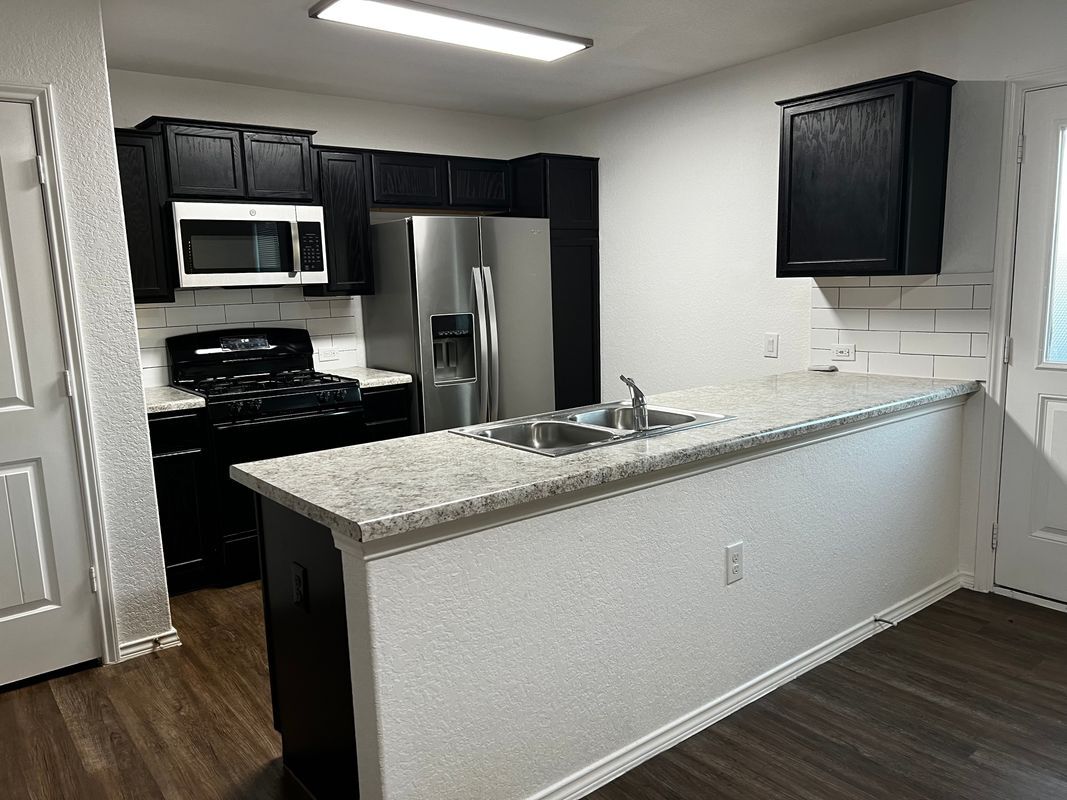 Building Photo - 7002 Cozy Run