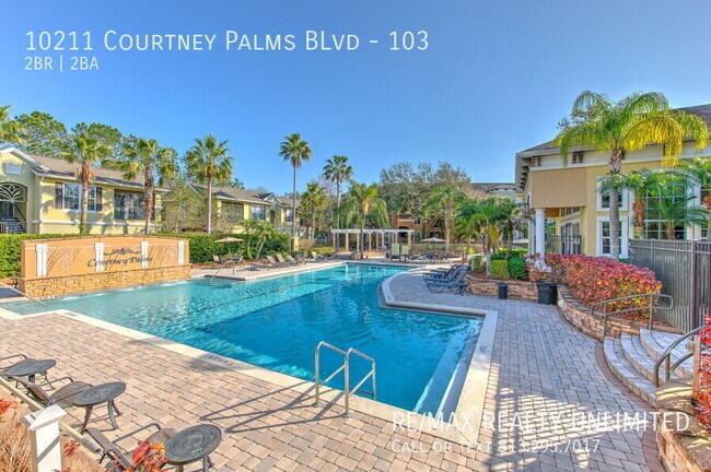 Building Photo - 10211 Courtney Palms Blvd