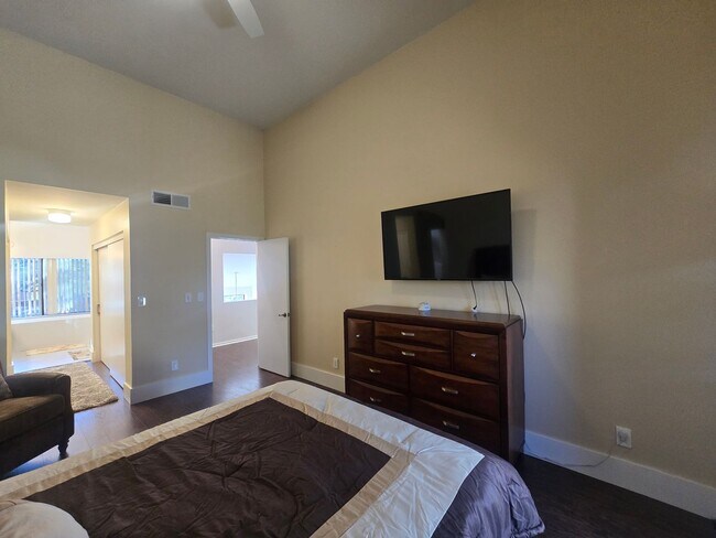 Building Photo - Furnished, 1-Year Long-Term Rental